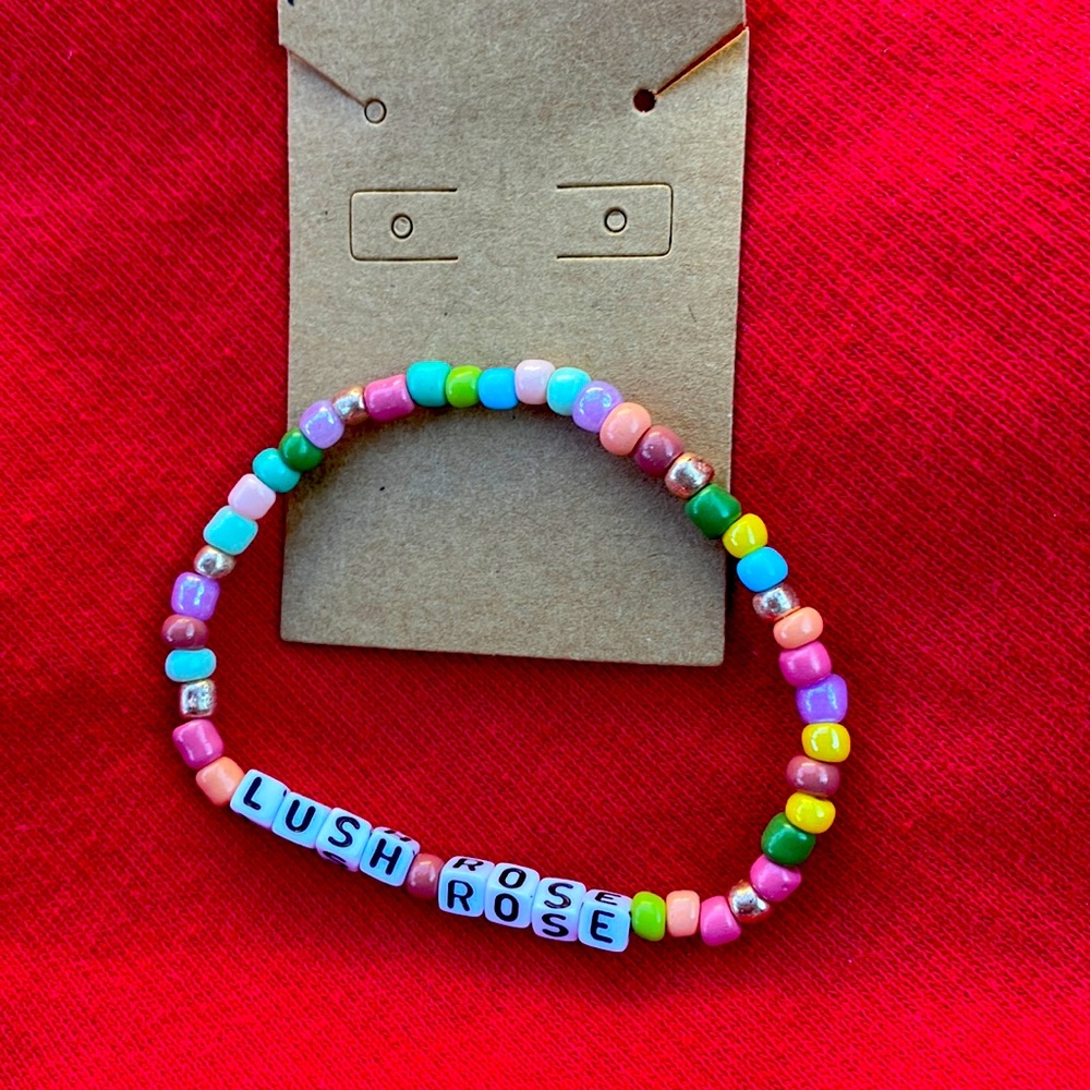 Lush Rose word bead bracelet approximately 7 inches in circumference